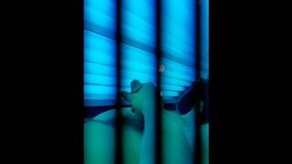 Watch me tense up as i cum on myself in this tanning bed