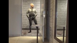 showing dolphin wetsuit bulge and silicone mask at hotel door and window, no cum